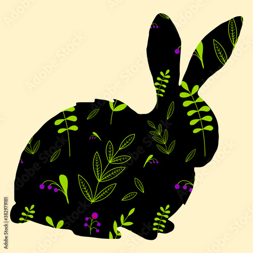 Easter bunny with floral pattern. A silhouette of a hare on a light background. Leaves and berries on a black background
