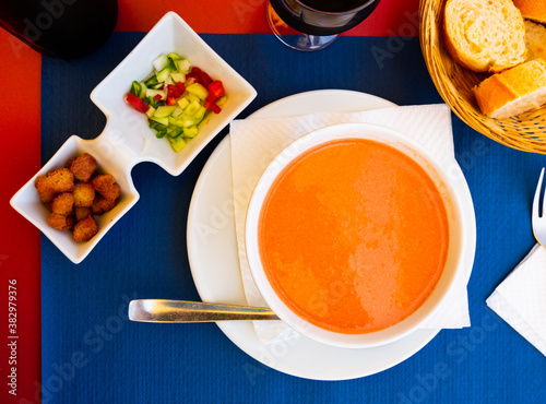 Andalusian gazpacho - vegetable soup puree traditionally served cold with crispy fried croutons. Spanish cuisine