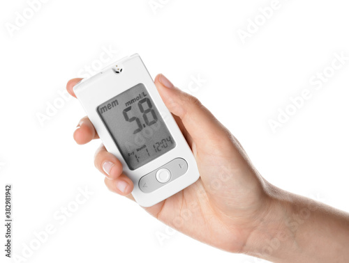 Female hand with glucometer on white background. Diabetes concept