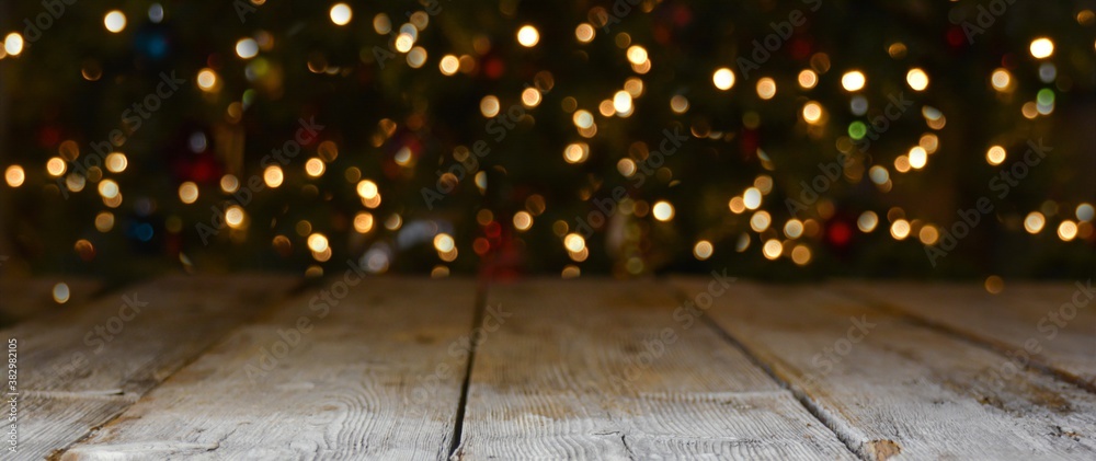 Christmas and New Year background banner with colorful bokeh lights and rustic wood - obrazy, fototapety, plakaty 