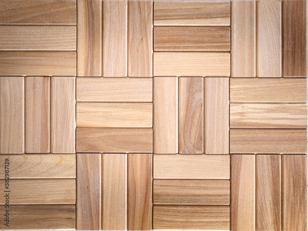 brown background of wooden planks in the form of parquet, top view - obrazy, fototapety, plakaty 
