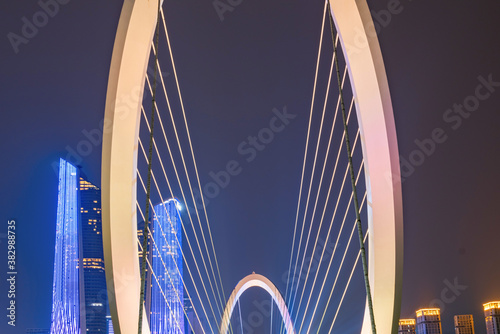 Eye of Nanjing Pedestrian Bridge and urban skyline in Jianye District, Nanjing, China photo