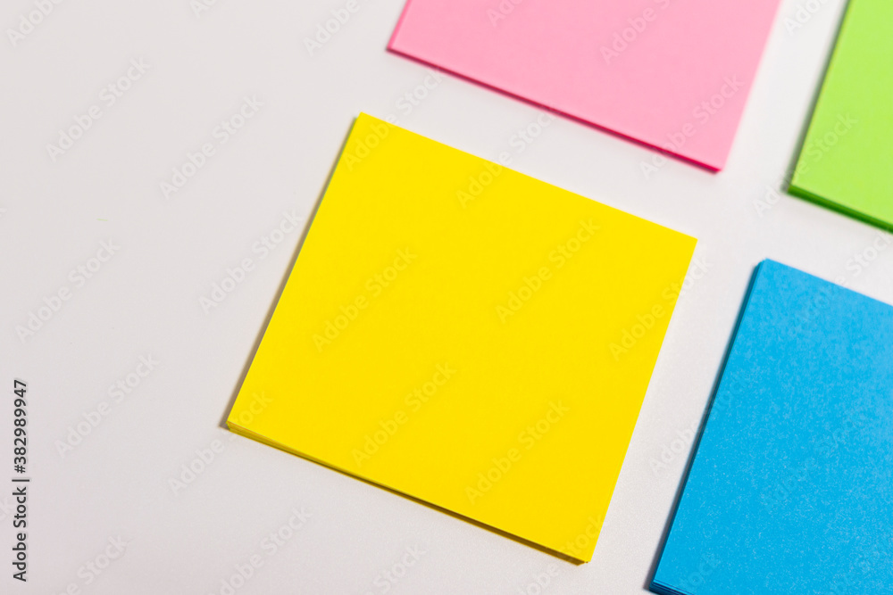 Sheets of paper of different colors are arranged diagonally. Sheets of paper of different colors are arranged diagonally.