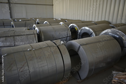 Rolls of steel sheet stored in warehouse; galvanized steel coil in the Duct Factory. Packed rolls of steel sheet, Cold rolled steel coils. Muscat, Oman : 05-10-2020