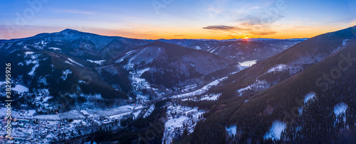 Canvas Print Panoramic shot of the Lysa Hora and Smrk mountains during sunrise