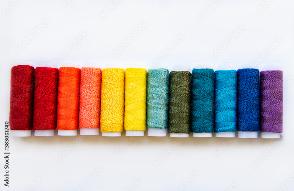 Spools of thread on the colors of the rainbow