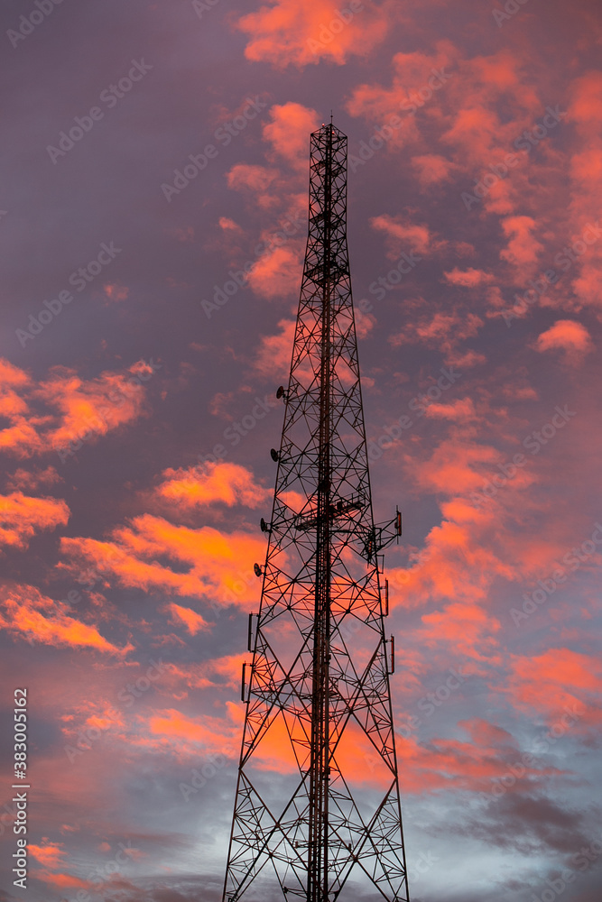 radio tower against sunset sky radio tower against sunset sky