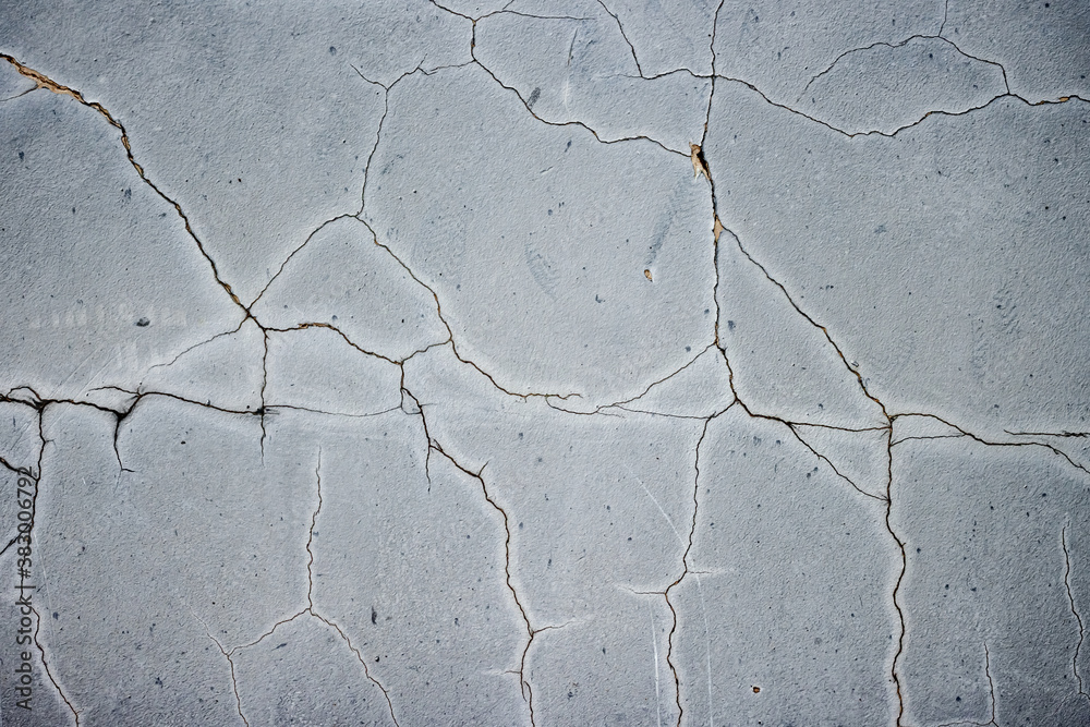 Obraz premium Concrete blue wall with cracks and dirty spots