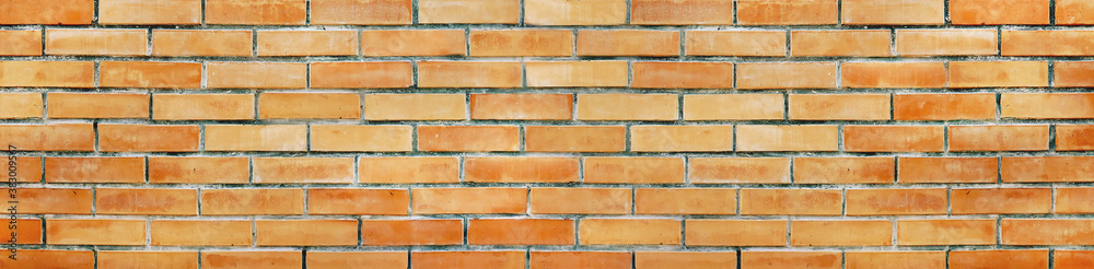 Spotted rough orange brick texture background. Brick wall banner Spotted rough orange brick texture background. Brick wall banner