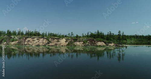 Sea bay surrounded by mountains. Peninsula Kony. The Sea of Okhotsk. Magadan Region. Russia. photo