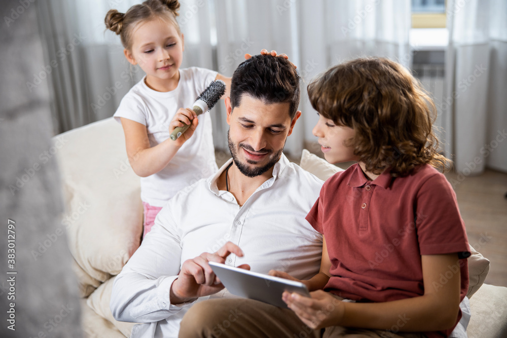 Father and son using a tablet Father and son using a tablet