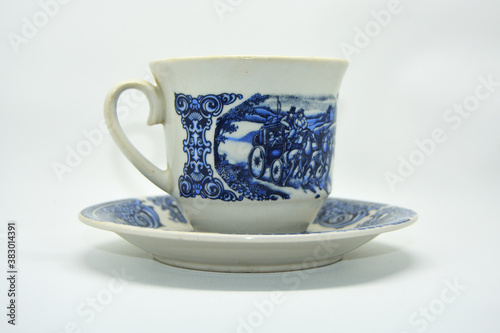 The cup has a classic blue pattern with a white background