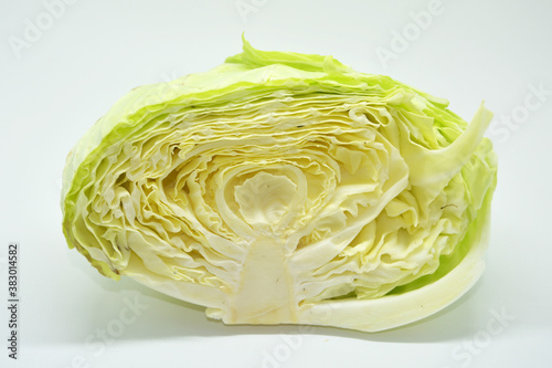 Fresh cabbage slices with a white background, suitable for posters and food and vegetable promotional content