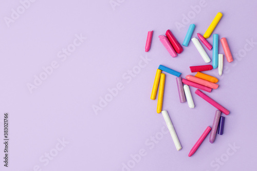Minimal Abstract purple pastel background with colorful wax chalk, Concept of pop art culture, 80s, 90s, creative design, nen plastic bold color experimental idea, copy space photo