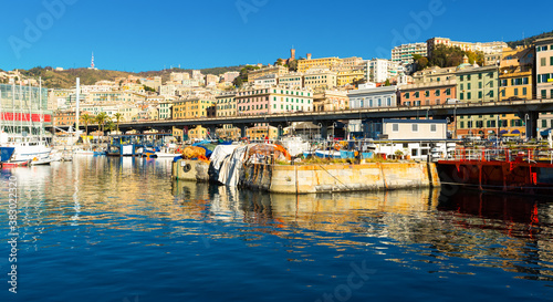 View of Old Port on background with cityscape of Genoa in sunny day