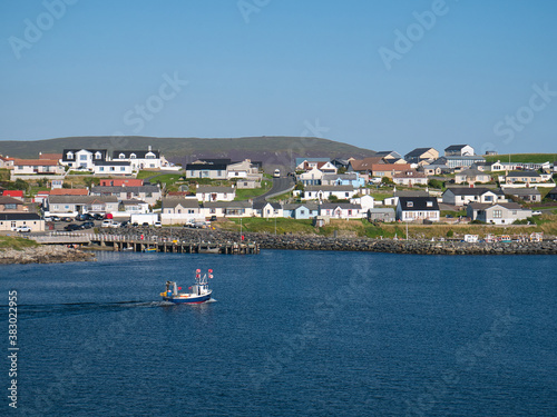 The coastal community of Hamnavoe on the west of Mainland, Shetland, Scotland, UK - taken from Fugla Ness on a sunny day in summer
