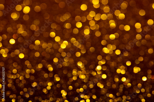 blured golden glitter texture abstract background