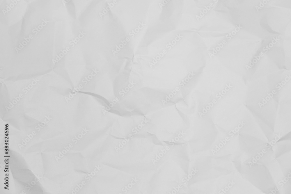 Obraz premium White crumpled paper texture background.