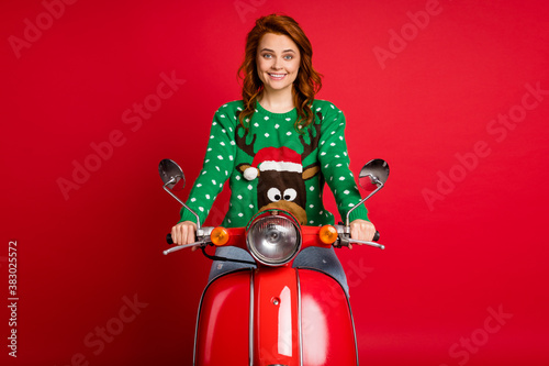 Photo portrait of scooter rider isolated on vivid red colored background