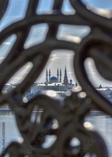 View of the Kazan Kremlin through an openwork bronze lattice