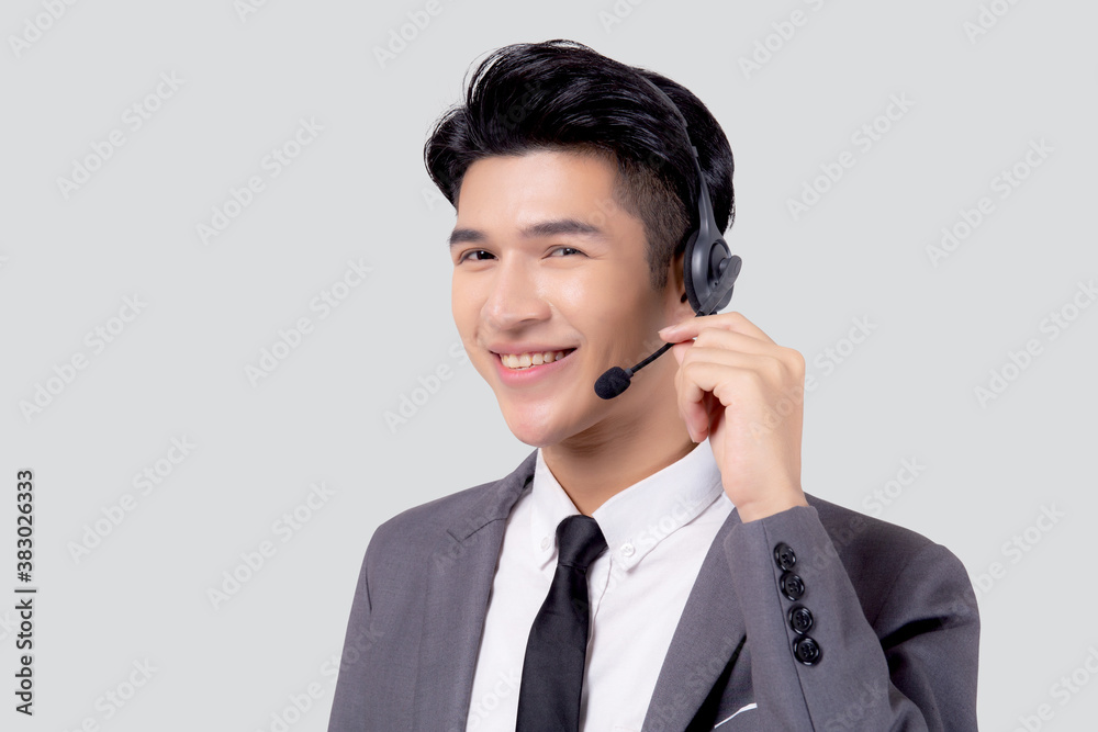 Portrait young asian business man call center wearing headset isolated on white background, agent with support and service, businessman is assistant for client with phone or helpline online. Portrait young asian business man call center wearing headset isolated on white background, agent with support and service, businessman is assistant for client with phone or helpline online.