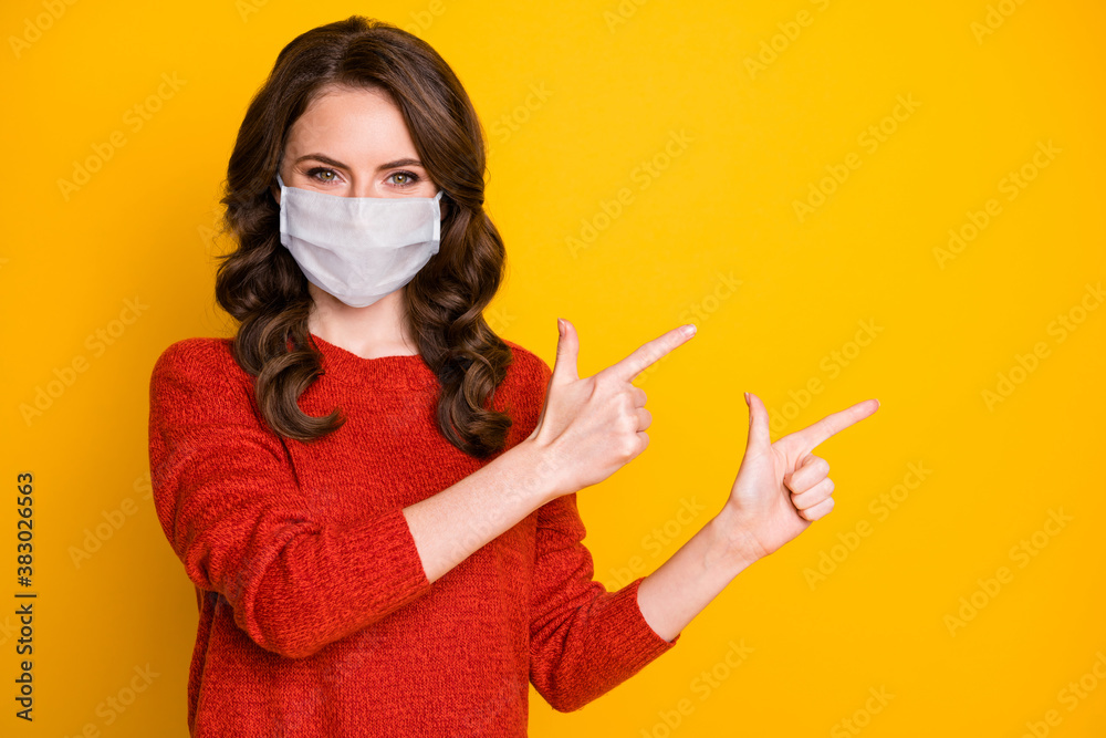 Portrait of positive confident girl point index finger copyspace direct way covid ads promotion wear good look jumper medical mask isolated bright shine color background Portrait of positive confident girl point index finger copyspace direct way covid ads promotion wear good look jumper medical mask isolated bright shine color background
