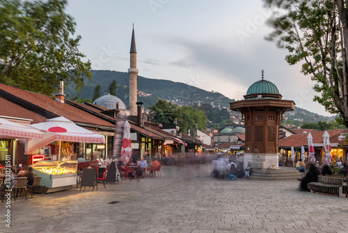 Bascarsija square with Sebilj wooden fountain in Old Town Sarajevo in BiH