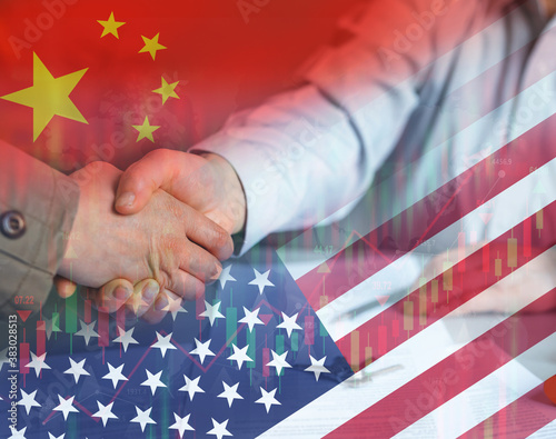 Canvas Print Businessmen shaking hands as a sign of China's cooperation with America