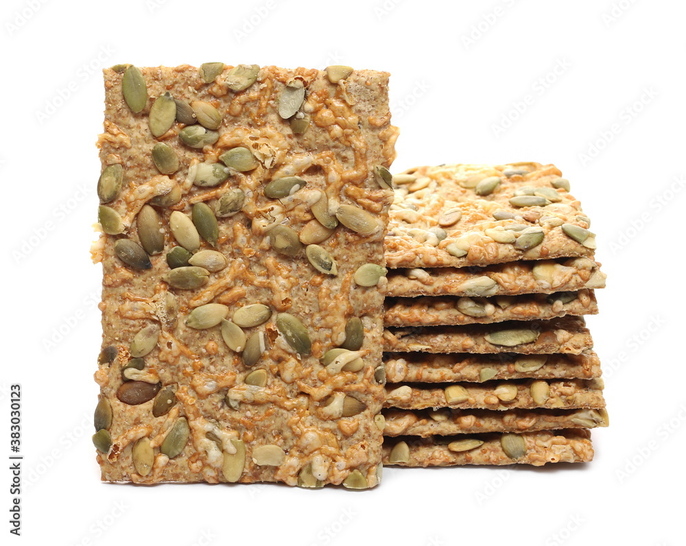 Crispbread with Gouda cheese and pumpkin seeds isolated on white background Crispbread with Gouda cheese and pumpkin seeds isolated on white background