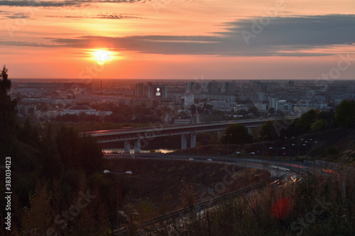 cars move in Nizhny Novgorod at sunset