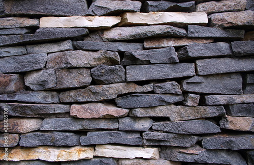 Grunge wall stone background textures, rock background. Real stone wall surface texture background.   © stefanbalaz