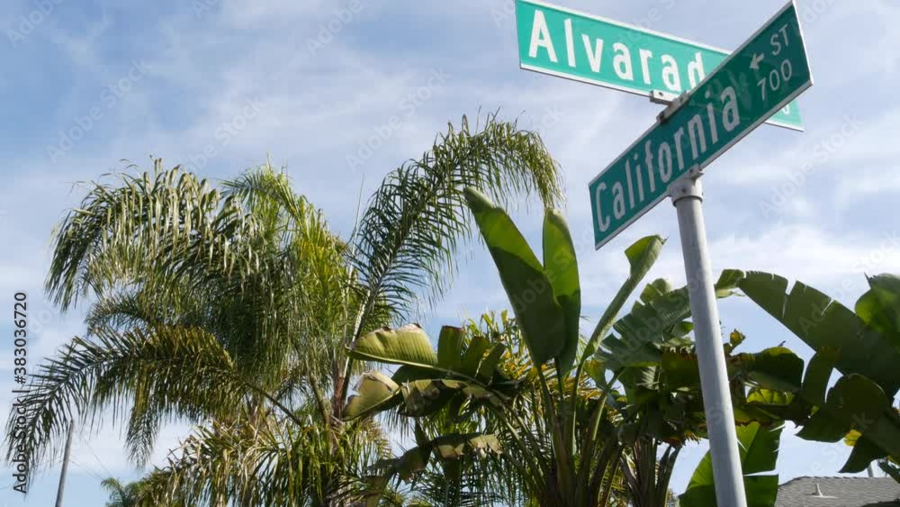 California street road sign on crossroad. Lettering on intersection signpost, symbol of summertime travel and vacations. USA tourist destination. Text on nameboard in city near Los Angeles, route 101.