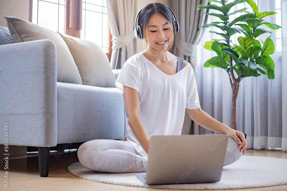 Woman relaxing while use laptop at home. Woman relaxing while use laptop at home.