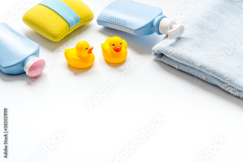 Baby accessories for bath with care products and rubber duck