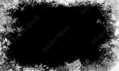 Snowflakes and snow borders on a black background, easy to use material photo