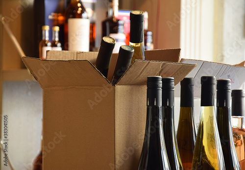 The wine is put in a box and ready for home delivery