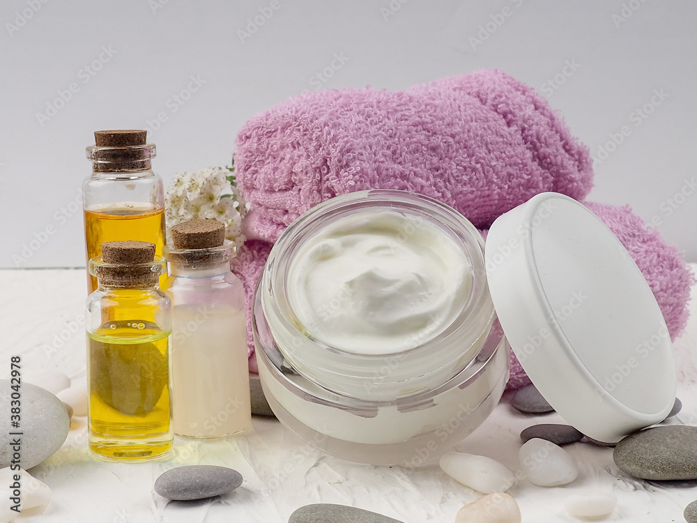Spa accessories with stones, Composition of spa treatment on table colorful background Spa accessories with stones, Composition of spa treatment on table colorful background