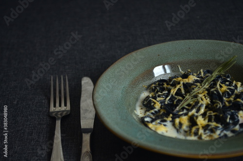 Italian pasta with cuttlefish ink close up