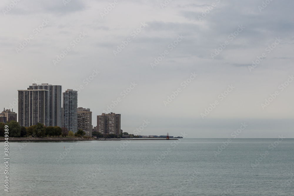 Apartment buildings on shore of Lake Michigan on overcast day