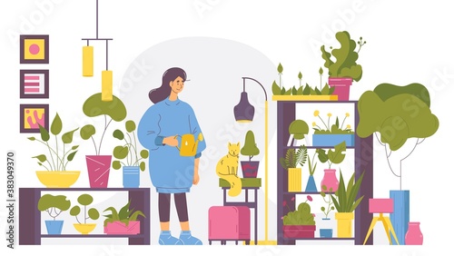 Young woman at home full of greenery, flowerpots and interior trees. Cosy house, character in casual clothes