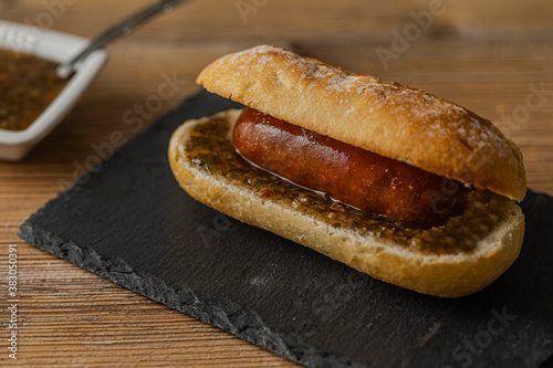 Choripan sandwich with chorizo popular in Argentina, Uruguay, Chile and southern Brazil