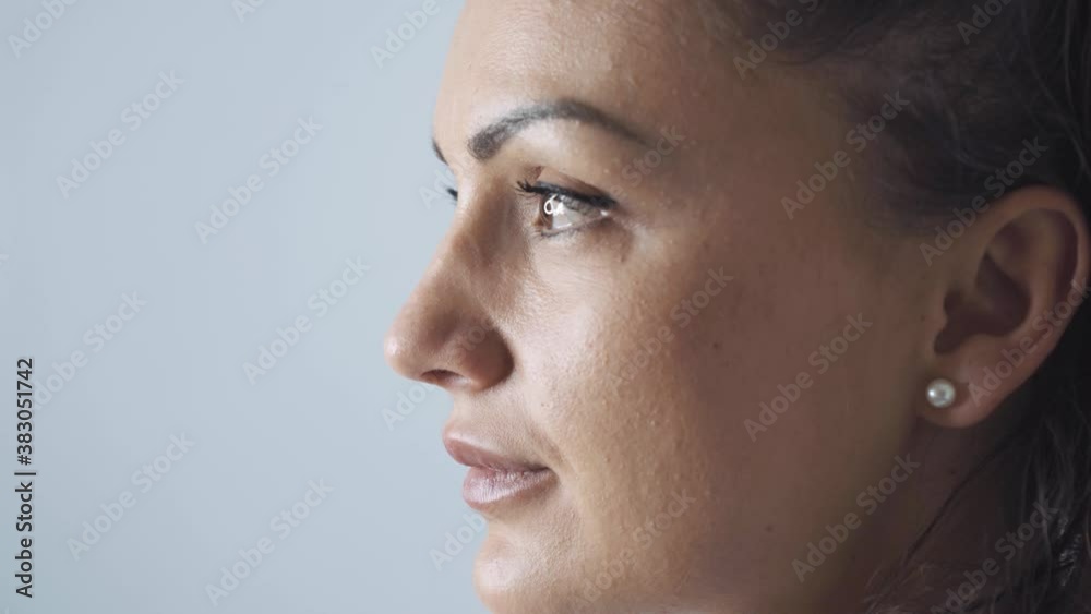 Stock video of a caucasian woman putting on a face mask. Stock video of a caucasian woman putting on a face mask.