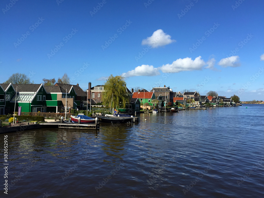 landscape of city view near sea coast at blue sky in Zaanse Schans, North Holland, Netherlands landscape of city view near sea coast at blue sky in Zaanse Schans, North Holland, Netherlands