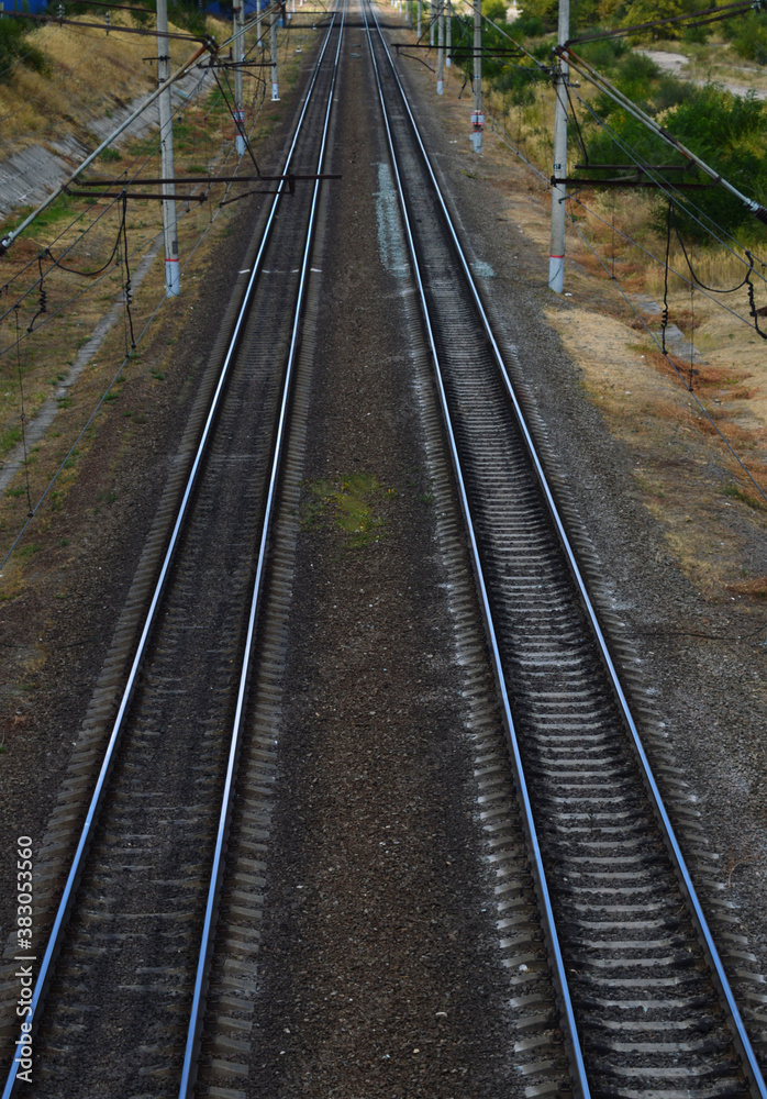Railway rails stretching into the distance