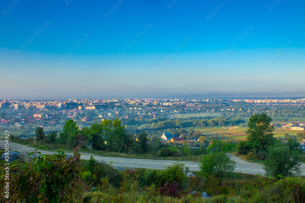 view from the mountain to the city in the morning