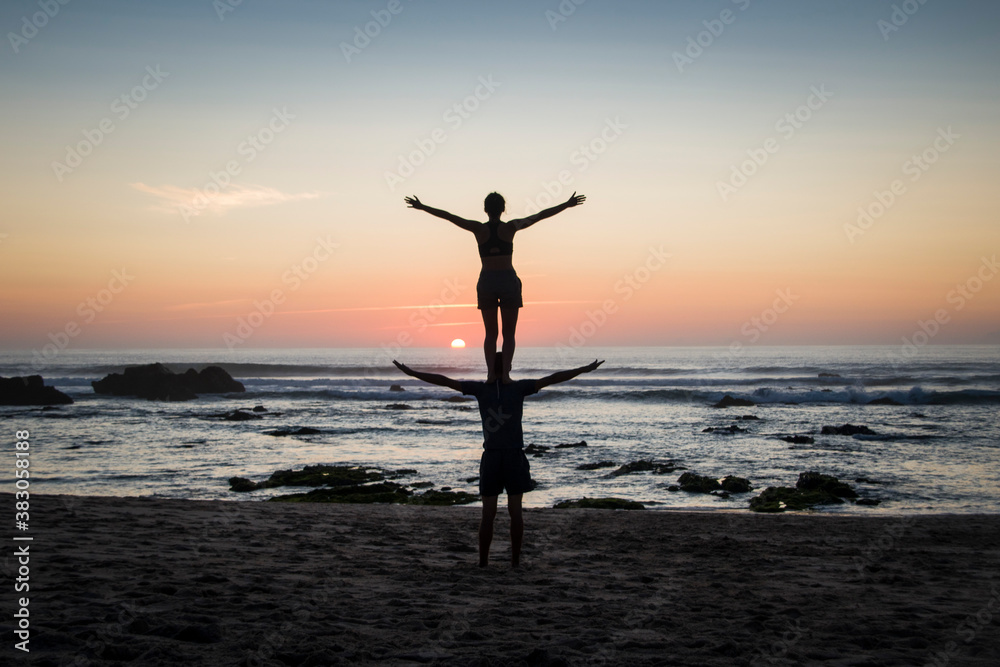 Couple on acrobatic stands