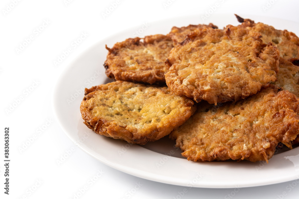 Traditional Jewish latkes or potato pancakes isolated on white background Traditional Jewish latkes or potato pancakes isolated on white background