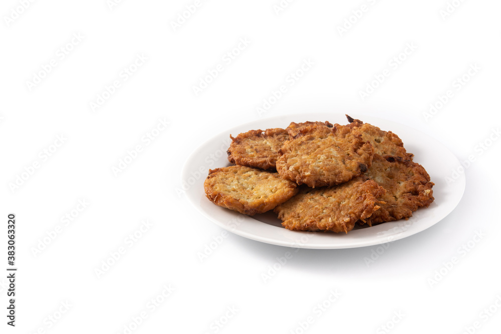 Traditional Jewish latkes or potato pancakes isolated on white background. Copy space Traditional Jewish latkes or potato pancakes isolated on white background. Copy space