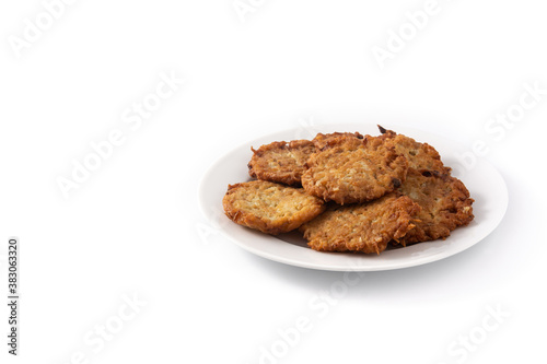 Traditional Jewish latkes or potato pancakes isolated on white background. Copy space