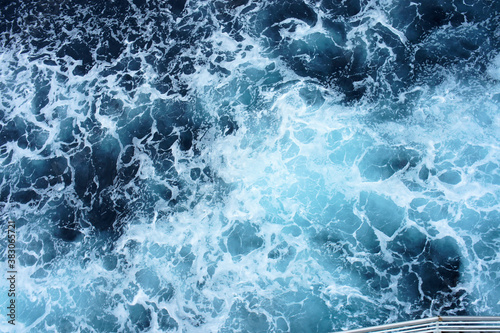 Foam on the surface of the seething sea. Abstraction. Background.